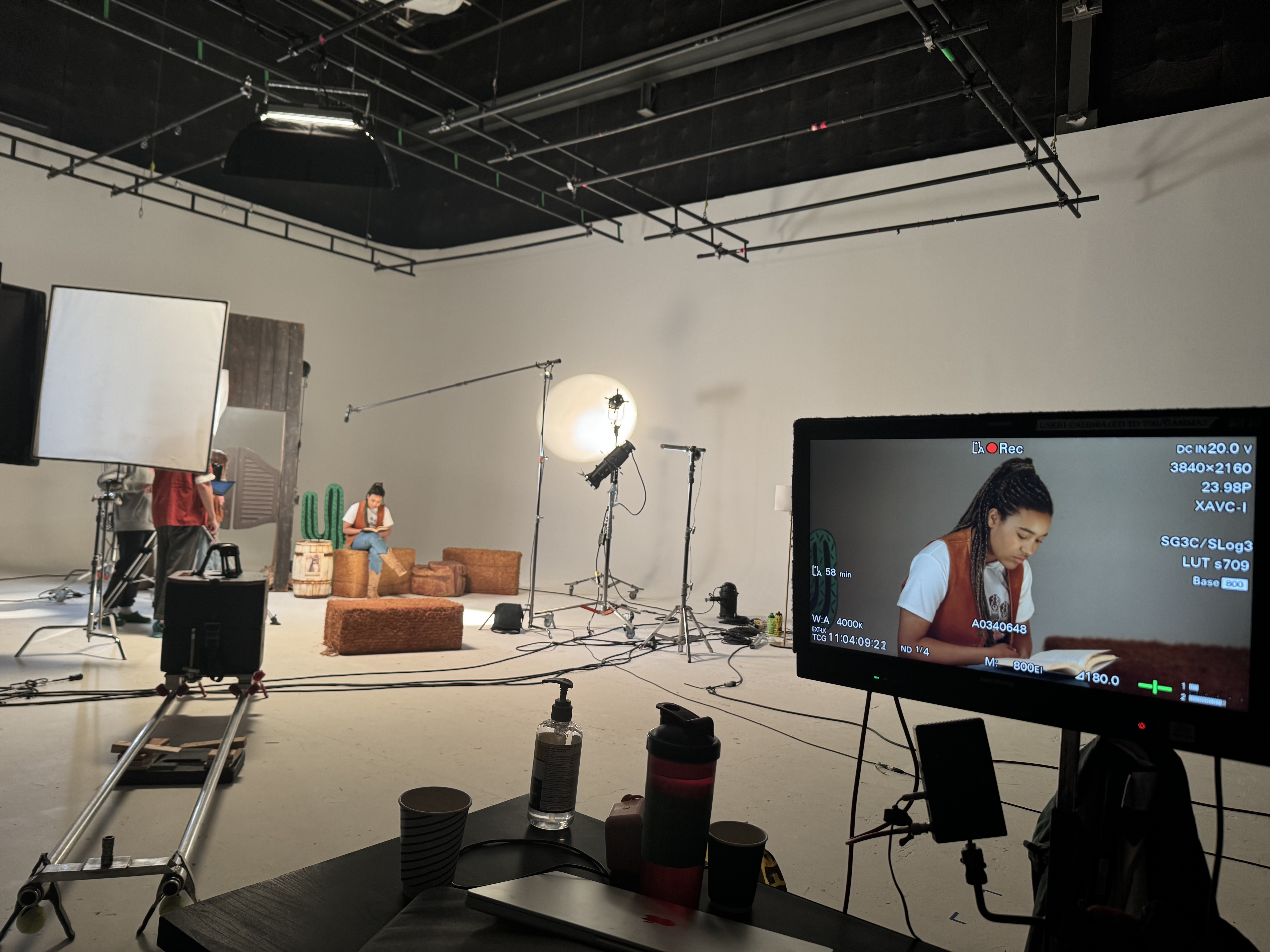 Teen speaking into a microphone during a podcast recording